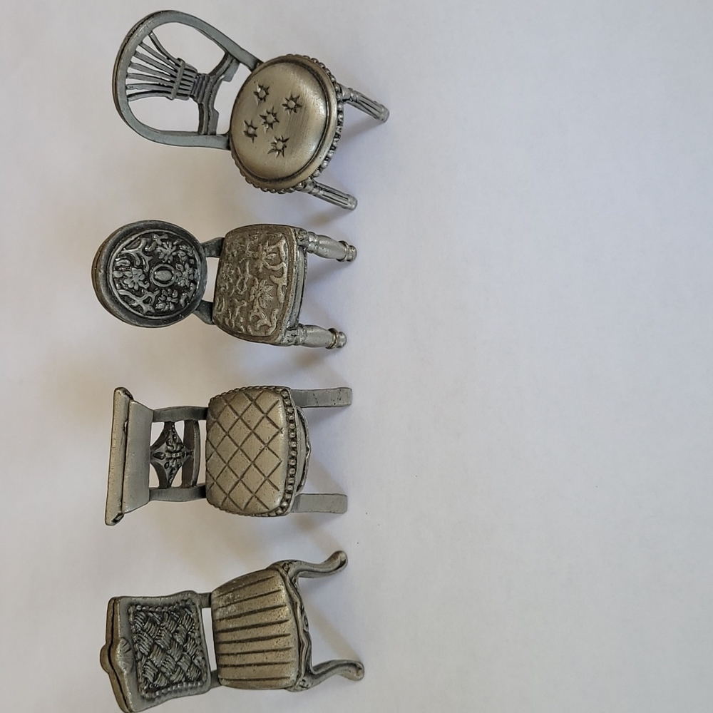 vintage pewter chairs approx 2in tall.